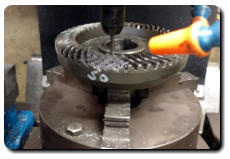 Machining in anchor pins for rebuilding teeth on hypoid ring gear